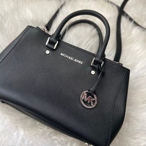 Lightly used Michael Kors medium black crossbody